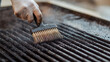 © forenna - Cleaning the Grill After a Barbecue with a Wire Brush