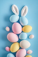 Wall Mural - a collection of easter-themed eggs decorated with bunny ears on a blue background, great for spring 