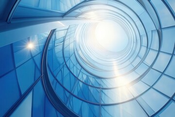 Wall Mural - modern glass skyscraper spiral staircase viewed from below creating geometric patterns with sunlight streaming through windows