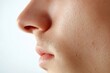 © Ева Поликарпова - A person's nose in close-up on a white background, ideal for beauty or medical uses