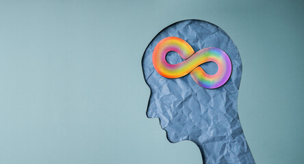 world autism day concepts. represent by a rainbow infinity symbol on the brain. autism awareness day