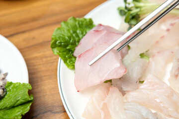 Sticker - Korean seafood dish. raw fish Sashimi