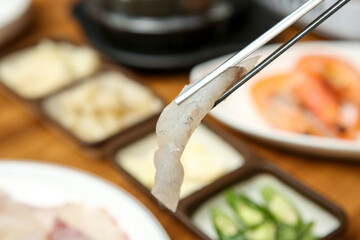 Sticker - Korean seafood dish. raw fish Sashimi