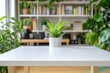 © CC - Bright white rectangular wooden table with overhead lighting and blurred office background featuring desk, bookshelves, and plants