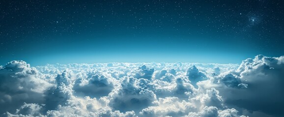 Wall Mural - Heavenly Heights: A panoramic view unveils a breathtaking expanse of fluffy clouds stretching to the horizon under a deep blue sky speckled with stars, evoking a sense of peace and wonder.