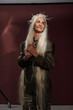 © Clique Images - Portrait of Elderly Woman with Long Flowing Hair Posing Gracefully