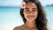 © Naiuang - Polynesian woman with glowing tan skin, long wavy dark hair adorned with a little hibiscus flower