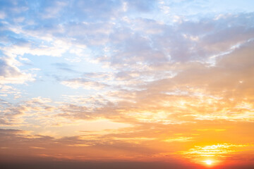 Wall Mural - beautiful , luxury soft gradient orange gold clouds and sunlight on the blue sky perfect for the bac