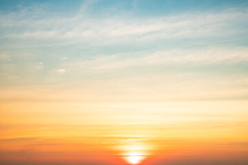 Wall Mural - Beautiful , luxury soft gradient orange gold clouds and sunlight on the blue sky perfect for the background, take in evening,Twilight, Large size, high definition landscape photo