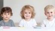 © Bella - Children drawing, indoors, smiling, creative activity