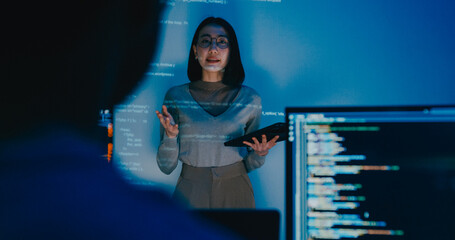 group adult asia female software developer mentor leader manager talk strategy plan to executive wri