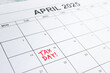 © A - Calendar of April 2025, with Tax Day reminder on the 15th. Deadline for filing Individual Income Tax Return and Corporate Tax Return. Taxation, tax season, tax reminder, regulatory filing concept