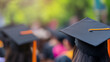 © CreativeUniverse - Graduation, close up student hats in during commencement success graduates of the university, Concept education congratulation.