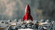 © DEER FLUFFY - Toy rocket placed on rubble representing creativity and innovation in a startup environment
