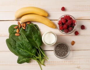 Wall Mural - Fresh ingredients for preparing green smoothie with banana, raspberry, spinach, almond, yogurt and chia seeds