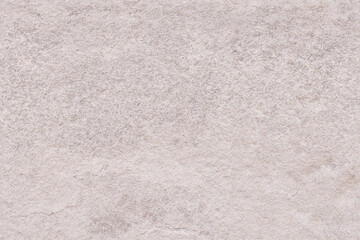 neutral grey stone seamless repeating texture or background
