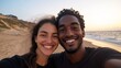 © Z A C - Couple sharing a joyful moment at sunset by the beach.