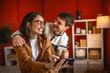 © Miljan Živković - happy couple use credit card and mobile phone for online shopping