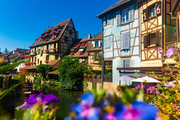 Wall Mural - Spectacular colorful traditional french houses on side of river Lauch in Petite Venise, Colmar, France