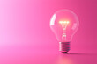 © Digital Sensei - Realistic 3D glowing light bulb symbolizing an idea, isolated on a solid color background