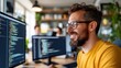 © LifeMedia - Software engineer creates innovative app in modern collaborative workspace