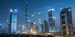 © grafixcareer - Cityscape at night global business operations and data connections.