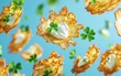 © Антон Федченко - Flying crispy potato pancakes with sour cream drizzle on sky blue background Saint Patrick Day