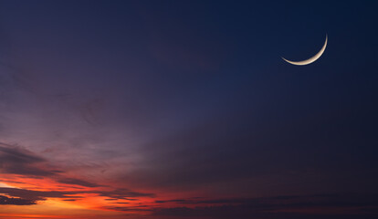 Wall Mural - crescent moon on dusk sky twilight after sundown, well free space for text arabic religious of islam