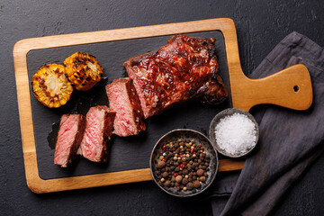 Wall Mural - A perfectly cooked sliced striploin steak with a juicy, tender texture