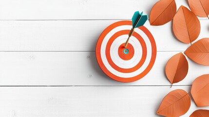 Wall Mural - A dart hitting the bullseye of a target, representing the achievement of a goal through focused thinking and strategic planning.
