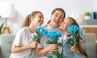 Wall Mural - daughters and mom with flowers