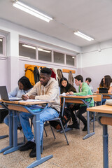 Wall Mural - High school students studying and learning in classroom