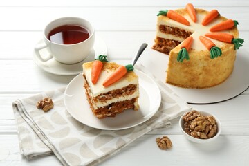 Wall Mural - Delicious homemade carrot cake served on white wooden table