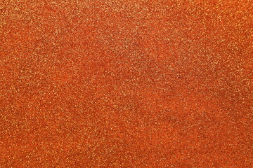 Shiny orange glitter texture background