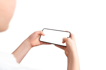 Aufkleber - Boy holds a smartphone in a gaming position, using both thumbs on the screen. Over-the-shoulder view, isolated display and background, perfect for game promotion.