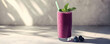 © Liffer - refreshing glass of blueberry smoothie garnished with mint leaves, showcasing vibrant colors and creamy texture. Perfect for healthy snack or breakfast option