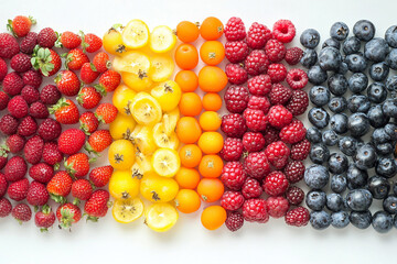 Wall Mural - Colorful berries and fruits beautifully laid out in a minimalist style