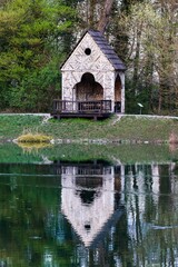 Wall Mural - Quaint Wooden Structure by Serene Lake