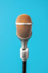 Aufkleber - Retro-Chic Microphone on Minimalist Blue Background for Dynamic Media Events - Professional Audio Setup Elevating Public Announcements and Modern Press Communications