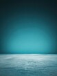 © zetrum - A tranquil and serene teal-colored background with a smooth, textured surface in a studio setting