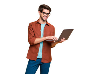 Fototapete - Portrait of his he nice attractive cheerful cheery successful smart clever intelligent brunet guy consultant agent broker holding in hands laptop isolated over beige color pastel background