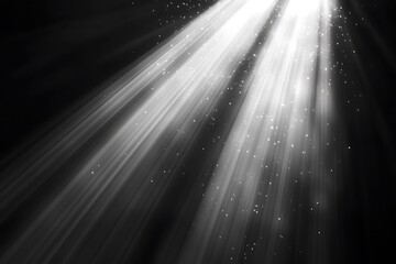Aufkleber - Bright light rays shining from above on black background with sparkles.