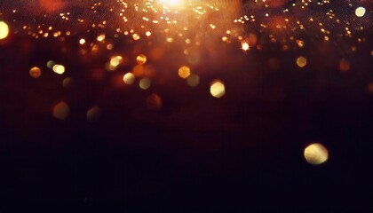 Poster - glowing abstract golden bokeh with sparkles on dark background, creative light trails for decoration or design
