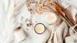 © ปฏิภาน ผดุงรัตน์ - Cozy home desk table soy candles and dried flowers on white background. Nordic hygge style concept