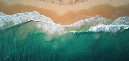 Aufkleber - Top aerial view blends sea, sand, earth tones. Ocean waves crash shore. Calm turquoise water meets sandy beach coastline. Summertime vacation background, travel inspiration, nature scene concept.