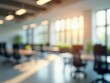 © Michael - Blurred modern open plan office with natural lighting and ergonomic chairs
