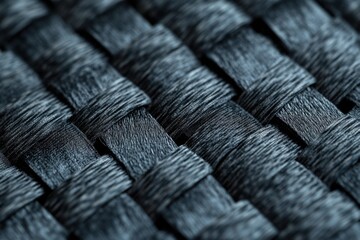 Poster - Close-up of intricate dark woven texture, showcasing detailed craftsmanship and intricate pattern.