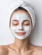 © southwind - Beautiful woman relaxing with white clay mask and towel on head