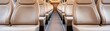 © Chanita - Frontal view of modern train interiors stylish and comfortable seating in urban transport