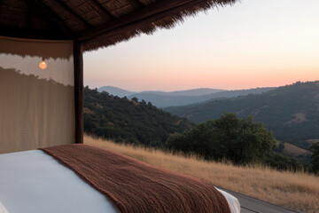 Wall Mural - A bed with a brown blanket and a view of the mountains